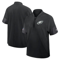 Philadelphia Eagles Sideline Short Sleeve Quarter-Zip Dri-FIT Coach Jacket | NFL On sale