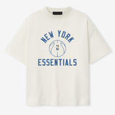 Cream New York Knicks Fear of God x Barkley L. Hendricks Unisex 90's T-Shirt | NBA