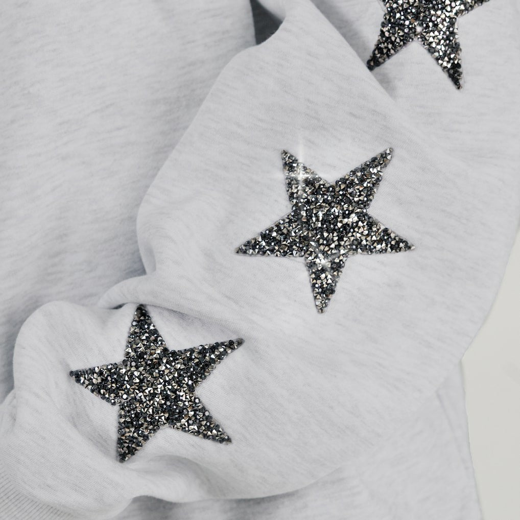 Las Vegas Raiders Gameday Couture Women's Resilience Relaxed Rhinestone Pullover Sweatshirt | NFL US